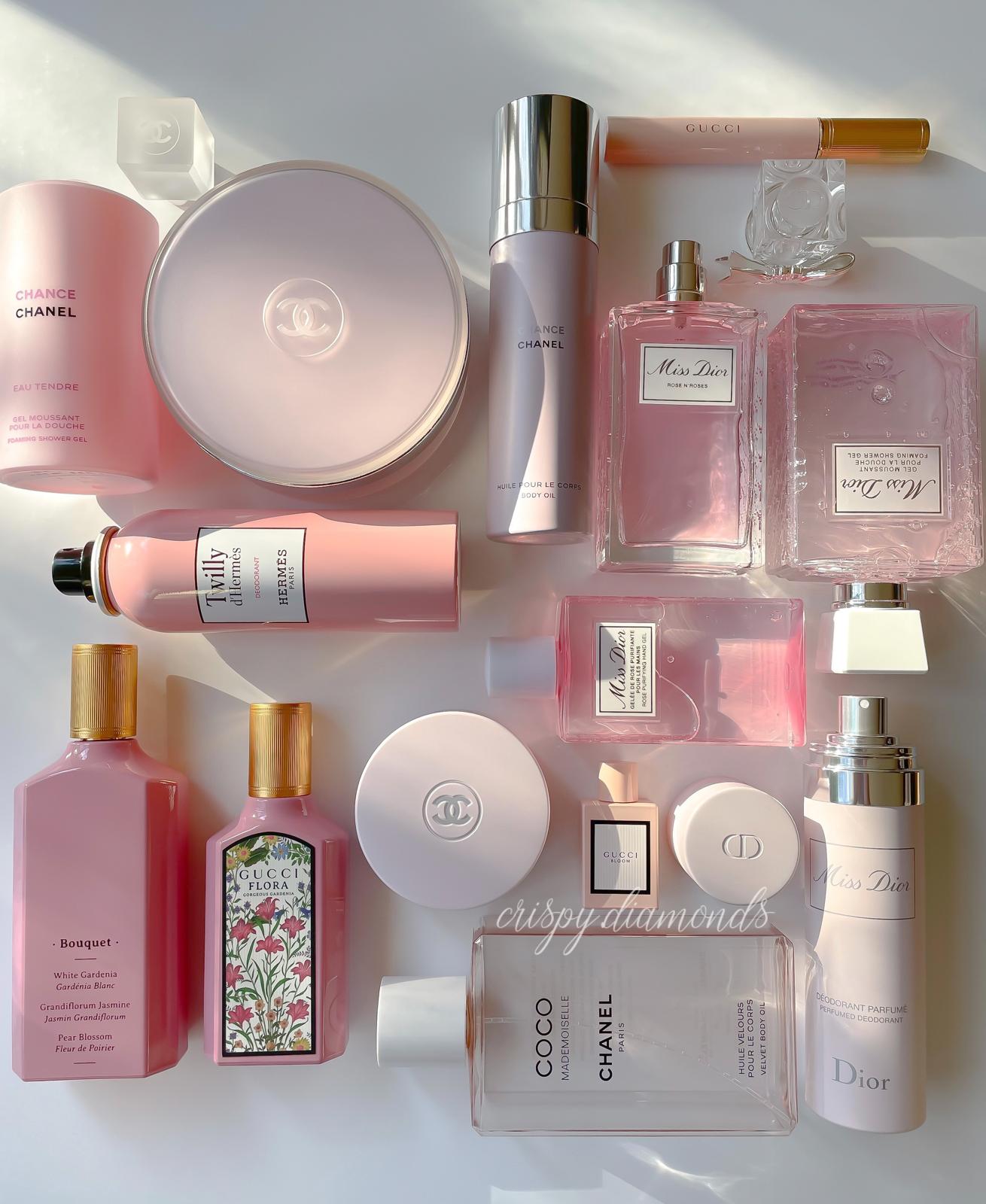 Luxury brand flatlay featuring Chanel, Dior, Hermes, and Gucci beauty products by @crispy.diamonds